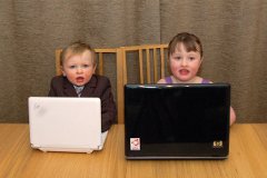 Children using laptop computers
