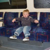 Toddler riding the London underground tube