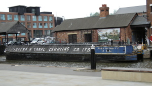 Canal barges (boats) outside the national waterways museum at Gloucester docks